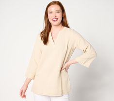 Simple-yet-stylish, this gauzy cotton top will be a mainstay in your summer wardrobe. Bell-shaped sleeves add dimension and create light and airy movement, while frayed edges give this tunic an undone, cool-and-carefree appeal. From Belle Beach by Kim Gravel. Beige Cotton Tunic For Daywear, Cotton Beach Tops With 3/4 Sleeves, Cotton Tops For Beach With 3/4 Sleeves, Summer Cotton Tunic For Spring, Spring Beige Cotton Tunic, Beige Cotton Tunic For Spring, Relaxed Fit Cotton Tunic For Spring, Spring Cotton V-neck Tunic, Cotton Tunic For Day Out With Relaxed Fit