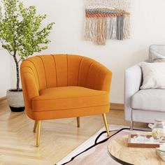 a living room with two chairs and a coffee table