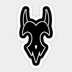 a black and white sticker with an image of a horned animal's head