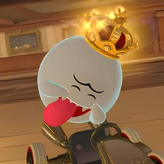 a cartoon character riding on top of a car with a crown on it's head