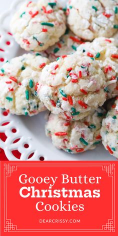 christmas gooey butter cookies on a plate with sprinkles in the middle