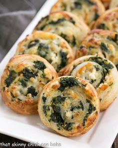 spinach and cheese muffins on a white plate