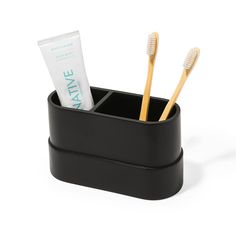 PRICES MAY VARY. Designed in Vancouver - We have meticulously designed this toothbrush holder for a modern and clutter free bathroom. Premium and Modern Design - Our sleek matte black large toothbrush holder, weighing 16 oz, boasts two compartments: one for toothbrushes and another tailored for toothpaste and other essentials. This smart design enhances organization, reduces clutter, and ensures hygienic separation of essentials for a hassle-free daily routine. Protective Pads - The inclusion of Toothbrush And Toothpaste, Toothbrush And Toothpaste Holder, Brush Teeth Kids, Floss Picks, Toothpaste Holder, Bathroom Modern, Black Resin, Electric Toothbrush, Mouthwash