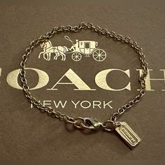 Brand New Without The Tags And Absolutely Gorgeous Describes This Authentic Coach Gold Link Charm Bracelet. Designer Stamped Coach On Hang Tag Dog Leash Clip Clasp Fits Up To 7.25” Wrist Matching Necklace Also Available In My Closet Formal Charm Bracelet With Adjustable Chain, Formal Adjustable Coach Bracelets, Classic Coach Adjustable Bracelets, Classic Adjustable Coach Bracelets, Coach Adjustable Bracelet As Gift, Adjustable Coach Bracelets For Gift, Adjustable Coach Bracelets As Gift, Coach Jewelry, Gold Link