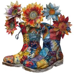 a pair of colorful boots with sunflowers in them