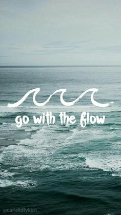 an ocean with waves and the words go with the flow written in white on it