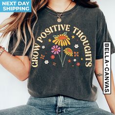 Grow Positive Thoughts Shirt, Mental Health Shirt, Inspirational Shirt, Motivational Shirt, Mental Health Matters Shirt, Therapist Shirt Welcome to BlueRidgeTee - Where Comfort Meets Style! Hello and a warm welcome to BlueRidgeTee! We're absolutely delighted to have you here. 💙 Elevate Your Wardrobe with our Premium, Soft, and Impeccably Crafted Shirts! Our shirts are not just shirts; they are a statement of quality. Clean, high-quality, and oh-so-soft, each piece is lovingly prepared by our dedicated team. Your Shopping Experience Matters! We value your time and trust, and it's our pleasure to assist you at any point. Have questions? Feel free to reach out! Finding Your Perfect Fit Women's sizes are tailored to be narrower at the waist. You may notice rolled-up sleeves in some product ph Mental Health Shirts, Grow Positive Thoughts, Cricut Designs, Inspirational Shirt, Positive Affirmation, Mental Health Matters, Health Matters, Roll Up Sleeves, Tee Design