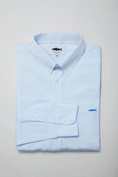 **This item is Pre-Order and will be shipped out after 11 February 2023Made from 100% sustainable cotton with a button collar, breast pocket, contrasting lining and a back loop, our premium periwinkle blue shirt is perfect for adding luxury to your smart or casual wardrobe. Fleet London shirts have a contrasting side seam gusset and collar and cuff placket taping, an embroidered salmon logo on the pocket, and come with spare buttons in a waxed paper envelope and a tailor’s tape measure. Buying m Blue Cotton Shirt, Smart Casual Shirts, Wholesale Shirts, Cotton Shirts For Men, Paper Envelope, Periwinkle Blue, London Blue, Tape Measure, Collar And Cuff