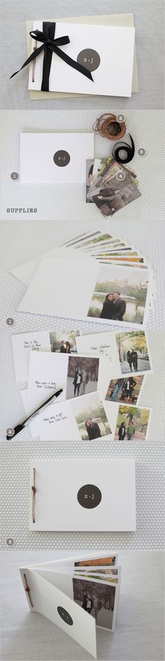 an open book with black ribbon and pictures on the cover, sitting on top of a table