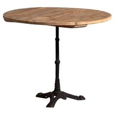 an old wooden table with metal legs and a round wood top on a white background