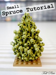 a small green christmas tree made out of legos