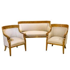 a set of three chairs and a couch