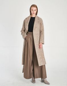 ■Made in KOREA ■COMPOSITION WOOL 80% POLYESTER 20% ■FABRIC QUALITY *A fabric made from a very light and soft (212 g/sqm) wool knit made of a STYLEM company in the Osaka region with a tradition of more than 40 years, like woven fabric. *Greige between beige and gray. Melange color with a warm and comfortable feeling. ■SIZE SPEC ONE SIZE ■CLOTHING CARE DRY CLEANING ■DESIGN POINT *Minimal and basic, very basic design *Luxury striped jacquard satin lining *Design points such as large pockets and sti Spring Merino Wool Outerwear For Work, Fitted Beige Merino Wool Outerwear, Chic Merino Wool Outerwear For Work, Chic Fitted Merino Wool Outerwear, Spring Beige Merino Wool Outerwear, Modern Merino Wool Outerwear For Fall, Elegant Brown Merino Wool Outerwear, Neutral Wool Coat For Work, Modern Beige Wool Coat For Winter