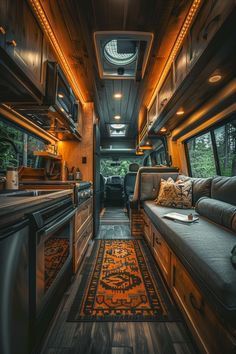 the interior of an rv with wood paneling and windows, couches, rugs and cabinets