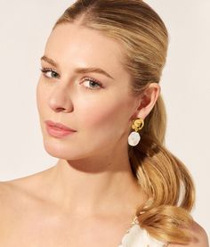 Our understated gold "coin" top earrings with hanging baroque pearls are a timeless reflection of your style-- a little glow that can take you from your big day to breakfast in your favorite jeans, years down the line. Gold-plated brass, baroque freshwater pearls 1.5" Drop Post or clip-on available Ships in 1-3 days For information on how to care for this piece, visit our Customer Care page Chic Yellow Gold Pearl Earrings For Wedding, Chic Yellow Gold Earrings With Pearl Charm, Chic Yellow Gold Drop Pearl Earrings, Chic Yellow Gold Pearl Drop Earrings, Top Earrings, Heel Accessories, Rose Lily, Lizzie Fortunato, Coin Earrings