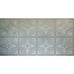 a metal wall panel with an intricate design