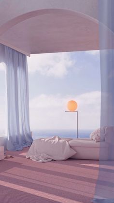 a bed sitting under a window next to a lamp on top of a wooden floor