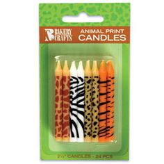 four animal print candles are in the package, one is orange and one is white