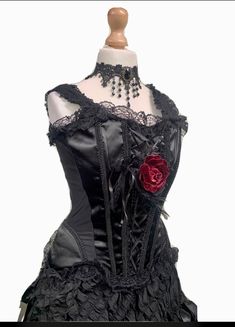 This is a high quality Raven gothic outfit consisting of the following;- 1. Hand crafted pretty choker 2.Black Satin corset with peplum and zip in the back .Size L fits Uk 14/16 chest 38/40 inch 3. pretty Red rose brooch with lace trim, beads and feathers. 4. Black heavy long skirt with elasticated waist band. It has ribbon detail.The fabric is unusual, fully lined . Please note the main photo has been taken with a hoop to show fullness. Thank you for looking Punk Style Corset For Fantasy Events, Black Steampunk Corset For Costume Party, Fitted Black Corset Dress For Fantasy Events, Gothic Corset Dress For Halloween, Gothic Fitted Corset Dress For Fantasy Events, Punk Corset For Halloween Costume Party, Punk Fitted Corset For Fantasy Events, Fitted Gothic Corset Dress For Fantasy Events, Punk Black Corset For Fantasy Events