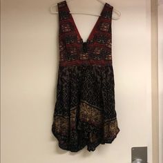 The Cutest Free People Dress! Never Worn Because It’s Too Big V-Neck Front, And Super Cool Detailing And Tie In The Back. Rayon V-neck Sundress Mini Dress, Casual V-neck Mini Dress With Boho Print, Black Boho Print Summer Dress, Black Summer Dresses With Boho Print, V-neck Mini Dress In Rayon, V-neck Rayon Mini Dress, V-neck Rayon Mini Dress For Date Night, V-neck Boho Print Sundress, Rayon V-neck Dress For Night Out