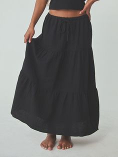 Easy and breezy. This elegant tiered cotton skirt is designed with a versatile waistband that can be worn both high rise or mid-rise, with an adjustable drawstring waist and a three tier design. Details: Drawstring elastic waistband, lined, tiered design Fit: True to Size Fabric: 100% Cotton (Crinkled Texture) Black Tiered Skirt, Elevated Basics, Three Tier, Tier Skirt, Cotton Skirt, Long Sleeve Bodysuit, White Skirts, Long Sleeve Maxi Dress, Long Maxi Dress