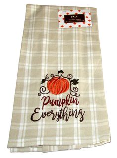 the pumpkin everythings dish towel is on display