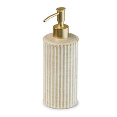 the soap dispenser is made out of white and gold striped paper towels