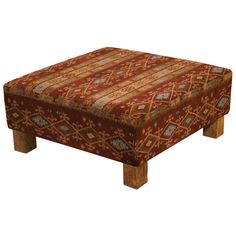 a footstool that is made out of wood and has a colorful pattern on it