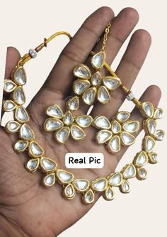 25%BULK ORDER DISCOUNT Coupon Code=SAVE25PERCENT 25% off when you buy 3 items https://www.etsy.com/shop/indianjewelrysets/?etsrc=sdt&coupon=SAVE25PERCENT         Indian Bridal Traditional Designer Antique Gold plated Studded Diamond & kundan Necklace Earrings Tika Jewellery Set  SHIPPING l be dispatched within 1-3 business day after the payment is clear. Items will arrive in 18-20 business days. The arrival time depends on some factors and different areas: We only ship to the confirmed address p Temple Jewelry Sets With Gota Work For Gifts, Festive Gota Work Jewelry Sets As A Gift, Festive Jewelry Sets With Gota Work As Gift, White Kundan Jewelry Sets, White Kundan Set For Puja, Gold Kundan Necklace With Mirror Work For Gift, Gift Gold Kundan Necklace With Mirror Work, Kundan Bridal Sets In Temple Jewelry Style, Kundan Jewelry Sets For Puja