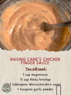 a recipe for chicken finger sauce in a glass bowl with a spoon on the side