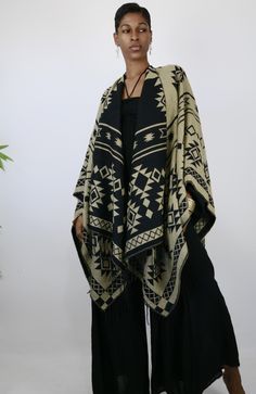 This gorgeous shawl is an easy throw and go addition. It’s tribal elements are woven into the garment. Great way to add a cozy, yet stylish finish to any outfit. Choose the black side or tan side…either way you are sure to look culturally chic. Belt not included. One Size Fits All Chic Belt, Black Side, One Size Fits All, The Black, To Look, Shawl, That Look, Black