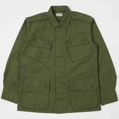 The ‘Jungle Fatigue Jacket’ has become a modern classic amongst menswear enthusiasts in recent years, and it’s easy to understand why. Military design is at its finest here, with a simple boxy shape for breathability, a showerproof 100% cotton outer shell for protection from the elements, Mil spec Urea buttons, and waist adjuster epaulettes for the perfect comfort fit. This is a piece which has stayed at the forefront of military design, and its classic style isn’t showing any signs of going awa Leather Helmet, Helmet Bag, Mil Spec, Military Design, Construction Details, Army Jacket, Vintage Models, Clothing Co, City Life