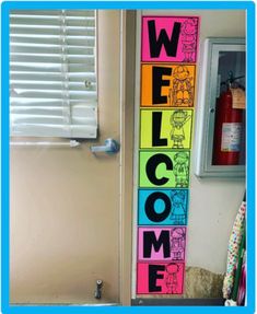 a welcome sign hanging from the side of a door