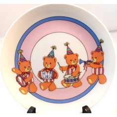 a plate with three teddy bears on it