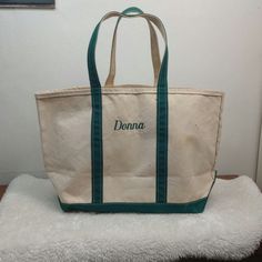 Vintage 80s 90s Ll Bean Canvas Embroidered Monogram Boat & Tote Long Handle Bag This Canvas Tote Bag With Green Trims Is A Stylish And Versatile Accessory For Everyday Use. Its Sturdy Handles Ensure Comfortable Carrying, And Its Lightweight Design Makes It Easy To Carry Around. 23" Across At Opening , 13" High , 8.5" Strap Drop Pre-Owned, Some Stains , Overall Good Condition For It's Age, There Are No Holes. There Is Some Fading On The Bottom Corners. See Photos For The Actual Condition Of The Items Boat Tote, Embroidered Monogram, Bean Bag, Handle Bag, Ll Bean, Canvas Tote Bag, Long Handles, L L Bean, Womens Tote Bags