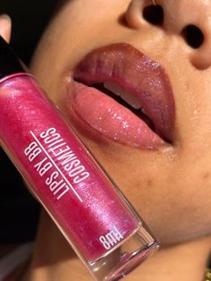 You know she is that girl 💘👄💅🏽Sink your lips into this color shifting baddie of a lip gloss💜💖 💖 Subtle pink tint - shimmery finish 💖 Holographic color shifting gloss - pink, purple + even blue!💖 Non-sticky, hydrating + moisturizing formula💖 One swipe chunky wand applicator💖 Sweet, yummy scent Ingredients: Vegan lip gloss base (Hydrogenated Polyisobutene, Ethylene/Propylene/Styrene Copolymer, Butylene/Ethylene/Styrene Copolymer, Pentaerythrityl Tetra-di-t-butyl Hydroxyhydrocinnamate), castor oil, grapeseed oil, jojoba oil, Aluminum Calcium Sodium Silicate, Titanium Dioxide (77891), Tin Oxide (77861), Red 7 Ca Lake (15850), sweet candy flavoring oil (soybean oil). (All ingredients are cosmetic grade approved) Lip Gloss Looks, Lip Gloss Aesthetic, Gloss Aesthetic, Purple Lip Gloss, Lip Gloss Base, K Makeup, Holographic Color, Vegan Lip Gloss, Shimmer Lip Gloss