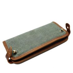 The Woosir Vintage Canvas Wallet is a stylish and functional wallet designed for everyday use. It is made from a waterproof canvas material and features a spacious main compartment, multiple card slots, a large coin pocket and a secure zip closure. This wallet is perfect for carrying cards, cash, coins and other personal items. The wallet also comes with a detachable wrist strap for convenience and a secure zip closure for added security.  
 ITEM DETAILS:  
  
 Item Size: 20cm x 10cm x 2cm  
 It Rectangular Travel Wallet With Pockets, Travel Rectangular Wallet With Pockets, Foldable Rectangular Wallet For Daily Use, Multifunctional Rectangular Wallet For Daily Use, Green Travel Pouch Wallet, Green Travel Wallet Pouch, Multifunctional Rectangular Wallet, Casual Bags With Pen Slots For Everyday Use, Multifunctional Rectangular Wallets With Interior Card Slots