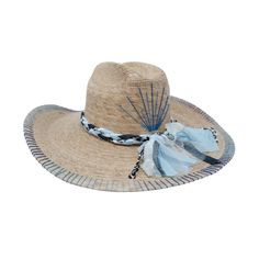 Our exclusive coastal cowgirl inspired design with embroidered blue agave! Natural Palm Straw Cowboy Hat by Corazon Playero. Custom designed and hand made hats by artisans in San Jose Del Cabo, Mexico. These hats are one size fits most with an elastic band inside to add comfort and fit for all head sizes. Each hat has a 3-4 week turnaround. Please note, all hats come with natural braid unless custom braid is purchased. Artisan Hats For Beach And Kentucky Derby, Blue Brimmed Sun Hat For Rodeo, Blue Curved Brim Sun Hat For Rodeo, Western Blue Sun Hat With Flat Brim, Blue Sun Hat With Curved Brim For Country Events, Wide Brim Blue Sun Hat For Rodeo, Western Style Blue Sun Hat With Flat Brim, Blue Curved Brim Sun Hat For Country Events, Blue Summer Hats For Country Events