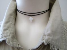 "This mini cross choker necklace features a natural white shell cross pendant hanging from sturdy polyester cord in black. The necklace finished off a stainless steel lobster clasp and comes with an additional 2\" extender chain. Simple and versatile. Great addition to your daily attire! White Shell Cross measures approx.0.39\"x0.55\"(10x14mm) ♥︎ Select your preferred necklace length at checkout. *Extender chain does not include in length. ♥ You will receive this necklace gift wrapped with an organza pouch. Please feel free to ask me if you have any questions. :) Check out my other items.   http://jaspersdream.etsy.com/" Cross Necklace Black, Shell Cross, Cross Choker Necklace, Lace Camisole Top, Cord Choker, Cross Choker, Organza Pouch, Mini Cross, Funky Jewelry