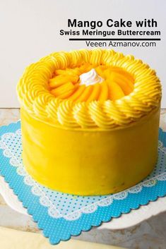 a yellow cake sitting on top of a blue and white plate