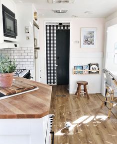 the kitchen is clean and ready to be used as a dining room or living room