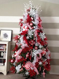 a christmas tree decorated with candy canes and snowflakes