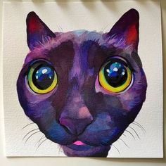 a painting of a black cat's face with bright yellow and blue eyes on a white background