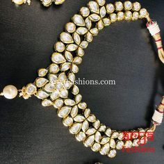 Bridal Kundan Necklace with Meenakari Necklace set includes Necklace with an adjustable string and a pair of earrings. Base Metal: Brass Earrings Dimensions: Approx. 2.5 Inches Luxury Kundan Necklace With Mirror Work As Gift, Meenakari Necklace, Earrings Necklace Set, Kundan Necklace, Statement Earring, Kundan Necklaces, Brass Earrings, Base Metal, Earring Necklace