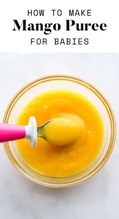 mango puree for babies in a glass bowl