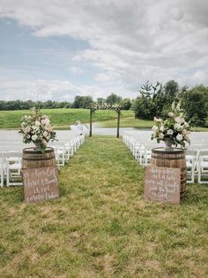 an outdoor ceremony set up with chairs and flowers