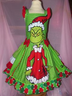 Very cute girl's  Dress  Size: 3t-23in length from shoulder to bottom dress sz-4t-24in sz 5t-25in sz 6 -26in Length from shoulders to the bottom of dress: waist stretch 20-30in Adorable Grinch dress, perfect for party! Your little girl will love the easy to put on and lightweight fabric. No itchy stitching! Not only will the family love the fun design, but your little darling is sure to love the cute print! Grinch Wedding, Grinch Dress, Bad Man, Christmas School, Man Party, Christmas Green, School Parties, Fun Design, Green Man