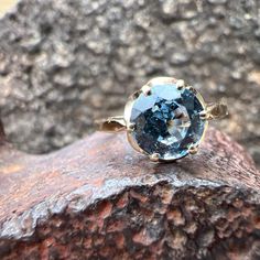 Gorgeous Blue Spinel set in a 10k Yellow Gold Ring. US size 6 Blue Spinel measures approximately 7mm in diameter. Widest point measures approximately 9mm. Tapers down to approximately 1.4mm at the back of the shank. Weighs approximately 2.1 grams.   Stamped 10K Blue Spinel Ring, Etsy Gold Ring, Multi Stone, Multi Stone Ring, Yellow Gold Rings, Stone Rings, Gold Rings, Jewelry Rings, Yellow Gold