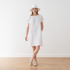 Fitted Linen Casual Sundress, Casual Fitted Linen Sundress, Casual Linen Sleeveless Dress For Daywear, Summer Linen Shift Dress, Fitted White Linen Sundress, White Fitted Linen Sundress, White Relaxed Fit Summer Dress, Summer Beach Shift Linen Dress, White Linen Knee-length Dress