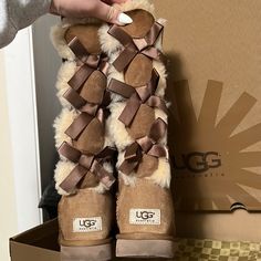 Ugg Bailey Bow Tall Boots Size 7 Minor Signs Of Wear Otherwise Very Great Condition Ugg Puffer Boots, High Ugg Boots Outfit, Ugg Boots With Bows, Ugg Boots Outfit, Uggs With Bows, Ugg Bailey Bow, Uggs Boots, Fluffy Shoes, Tall Uggs